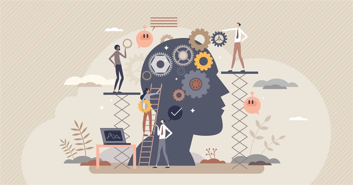 Photo with a silhouette of a head with gears and clipart people made to look like they are working on the brain.